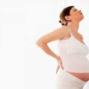Защо болки в гърба по време на бременност?