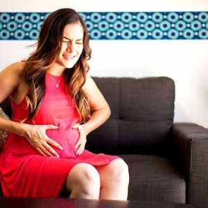 Защо дръпнете долната част на корема по време на бременност?