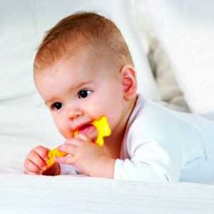 Шофиране никненето на зъби при деца